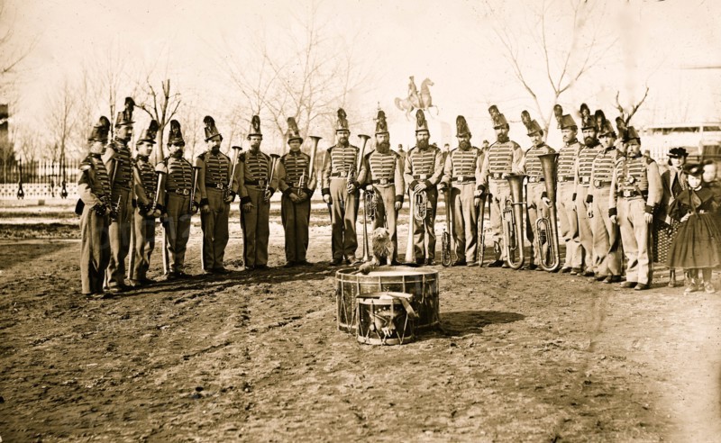 Washington, D.C. Band of 9th Veteran Reserve Corps, in shakoes and frogged jackets, at Washington Circle 1865