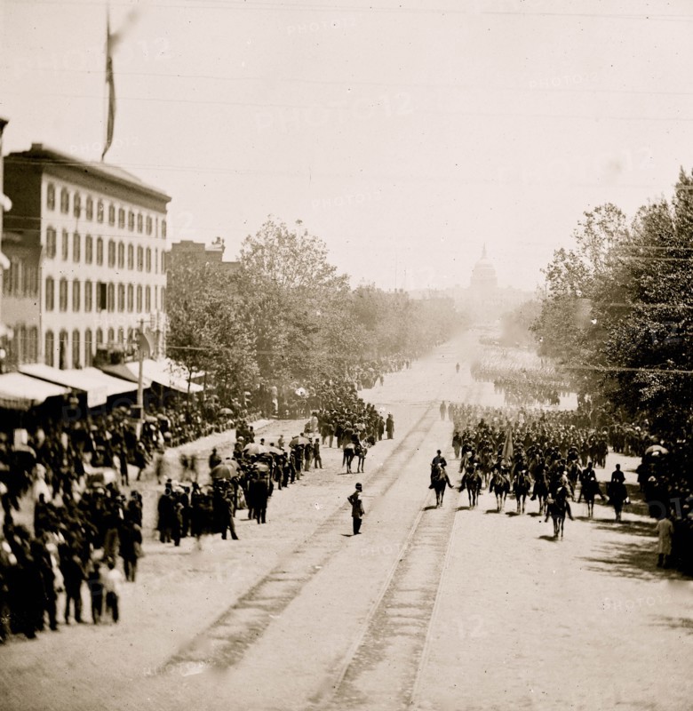 Washington, D.C. Maj. Gen. Horatio G. Wright, staff and units of 9th Army Corps passing on Pennsylvania Avenue near the Treasury 1865