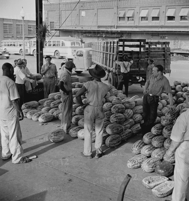 Washington, D.C. Unloading watermelons at the farmers' market 1942