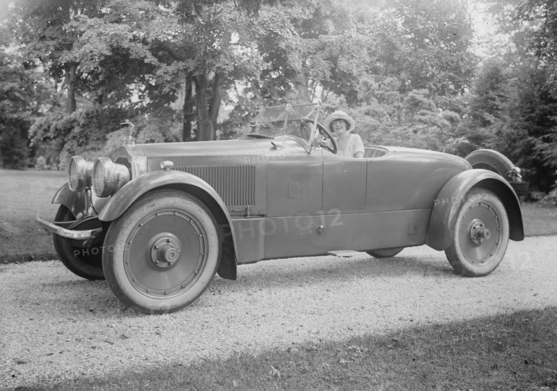 Woman Driver in Fancy Rolls Royce