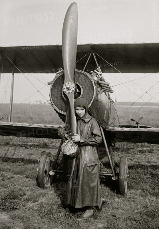 Woman hugs Plane Propeller