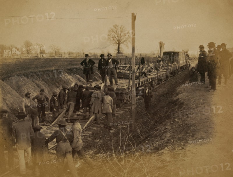 Wrecking train and gang clearing wreck 1863