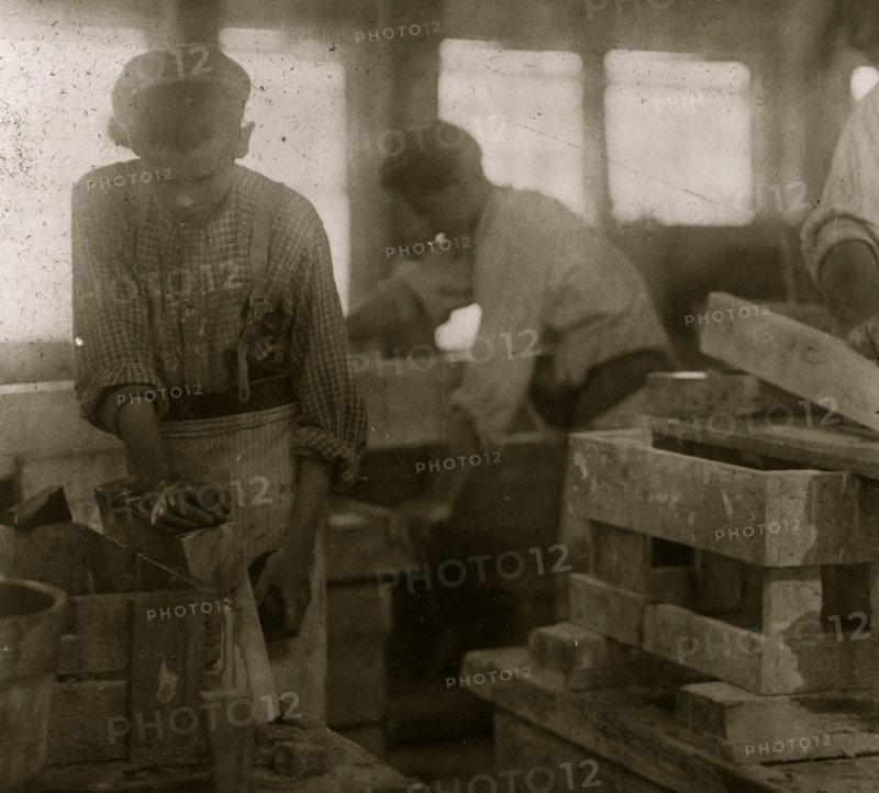 Young boy polishing marble in Vermont Marble Co., 1910