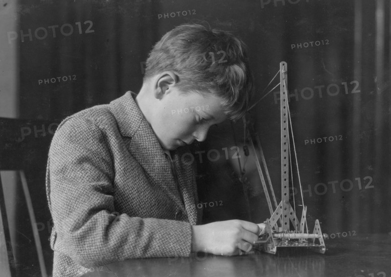 Young Boy with a Mechanical Toy 1924