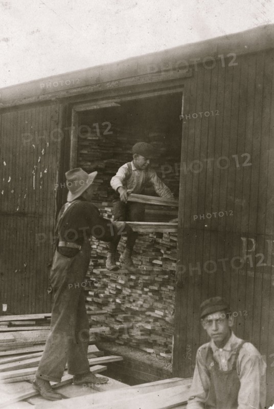 Young boy working for Hickok Lumber Co. Location: Burlington, Vermont. 1910