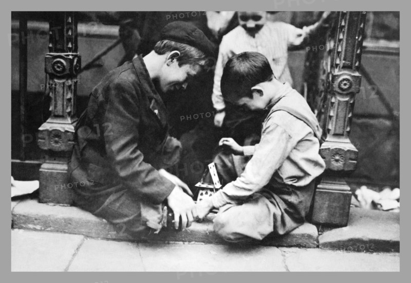 Street Kids Build House of Cards