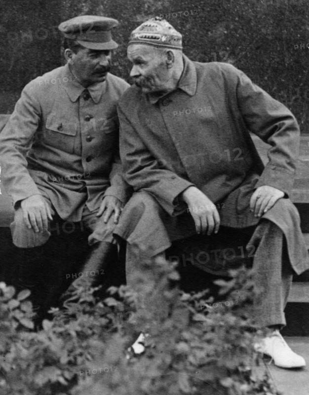 Joseph stalin speaking with playwriter maxim gorky at lenin's tomb in 1931.