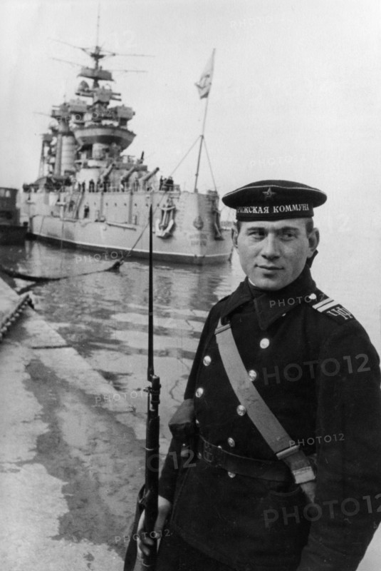 Black sea fleet, a soviet sailor on watch at the battleship paris commune, march 1943.