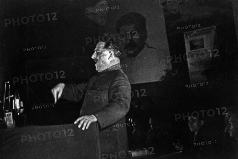 Grigoriy konstantinovich ordzhonikidze (sergo ordzhonikidze) speaking and giving details of the program for developement of basic industries under the new five-year-plan at the congress of the russian communist party.
