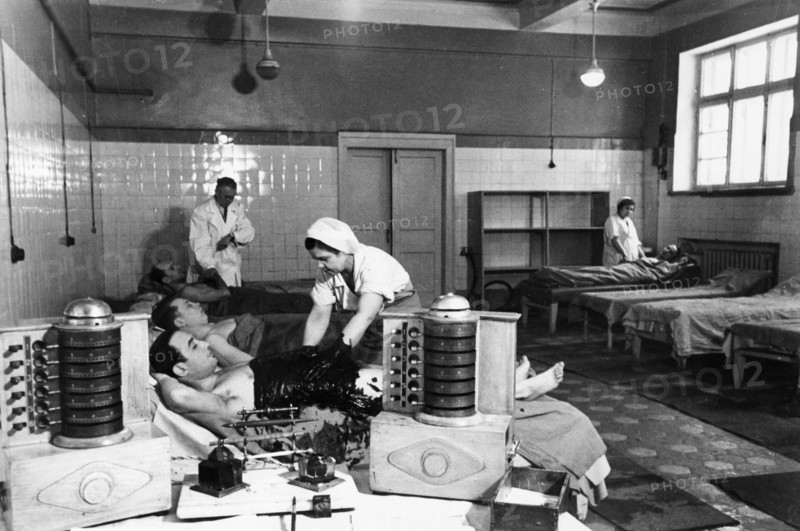 Soviet health spa, the mud baths of a clinic for workers at the central health resort institute, june 1952.