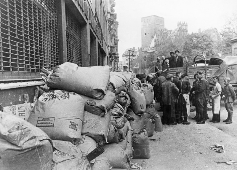 Soviet food relief, bags of flour and suger ready for distribution to stores in berlin,  1945 or 1946.
