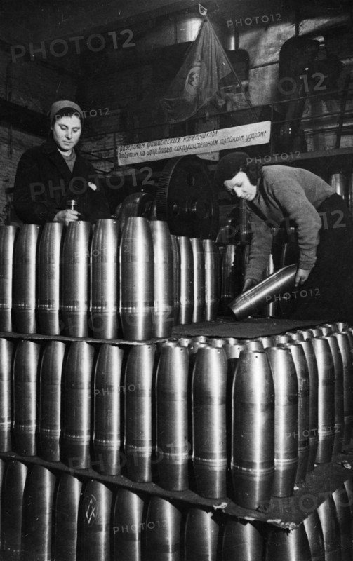 Civilian women involved in the production of artillery shells at a munitions factory in moscow during world war 2, march 1942.
