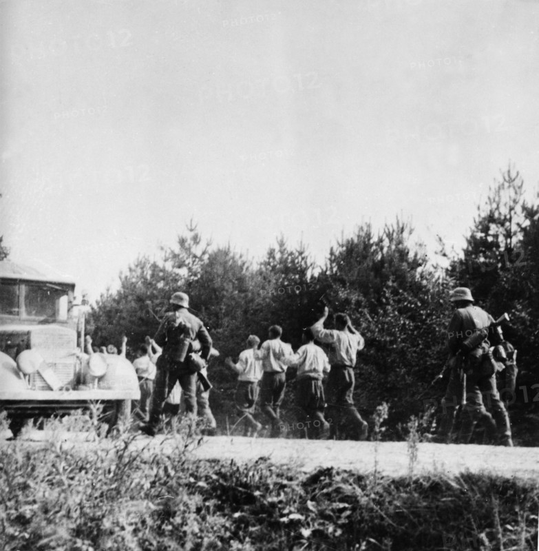 Nazi invasion of poland, german soldiers with polish p,o,w,s in september 1939.