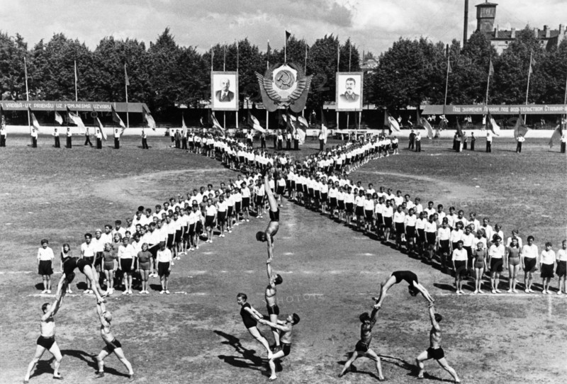 Song festival in riga, sport performance of the pupils of the training institutions of the administration of labor reserves of the latvian ssr on the occasion of the 10th anniversary of soviet latvia, july 1950.
