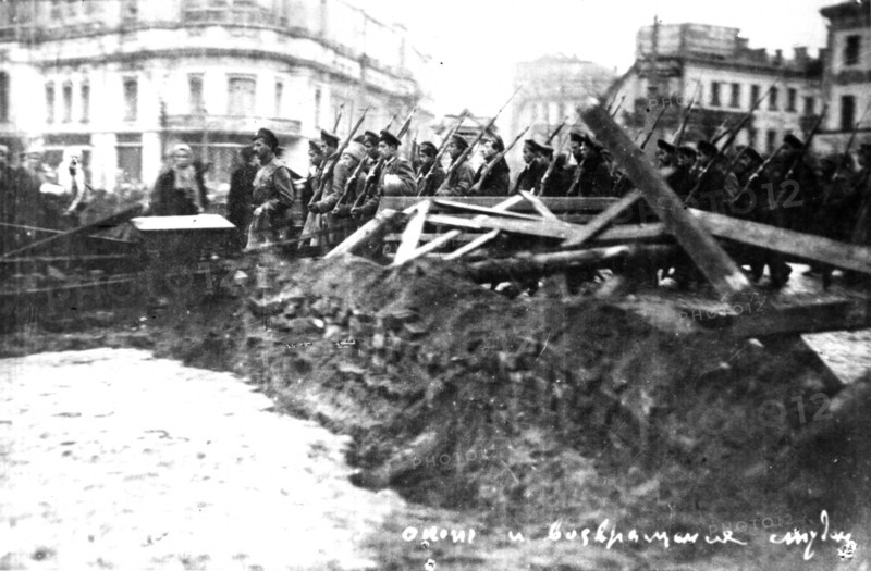 White guard student company marching along barricades in arbat square in moscow, october - november, 1917.
