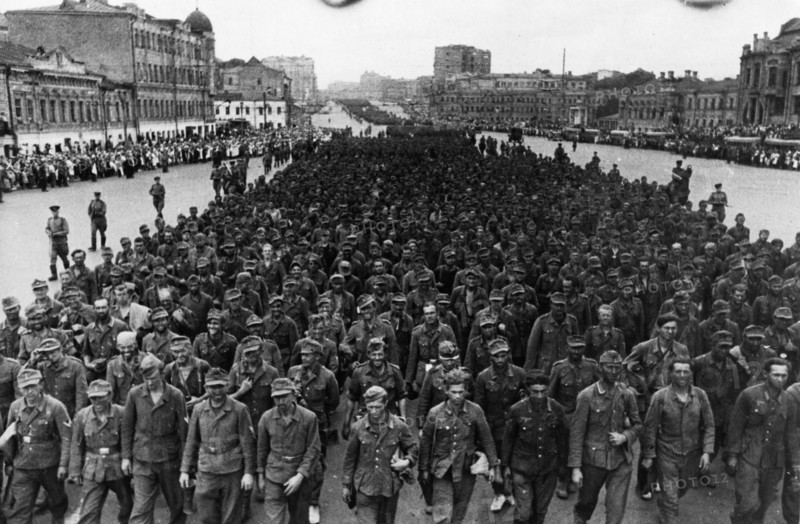 World war 2, 57,600 german soldiers, taken prisoner in the last few days by the troops of the 1st, 2nd, and 3rd belorussian fronts, being marched through the streets of moscow on their way to pow camps, july 17, 1944.