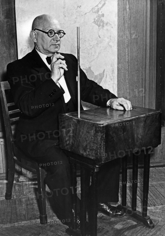 The orchestra of electric musical instruments, konstantin kovalski playing the termenvox (theremin) invented by lev termen (leon theremin), moscow, ussr, december 1957.