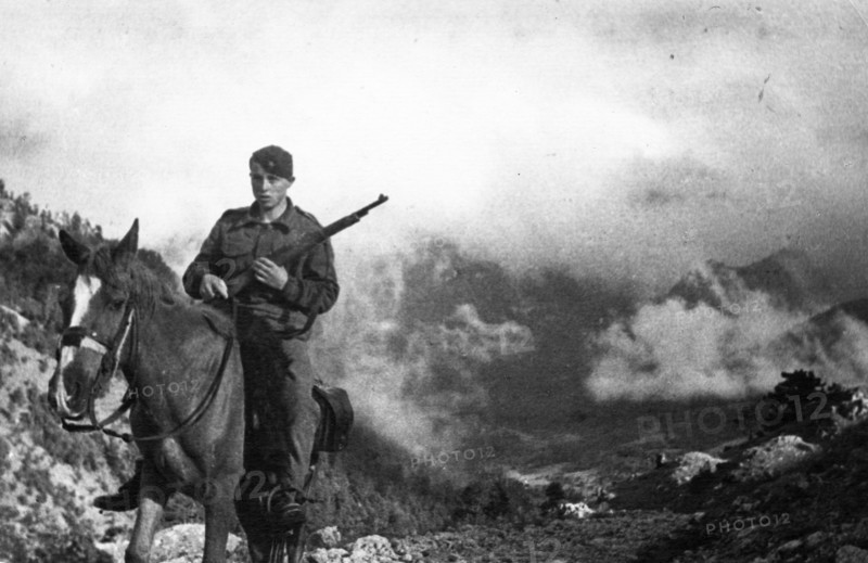 World war 2, a yugoslavian partisan scout in the mountains of yugoslavia.