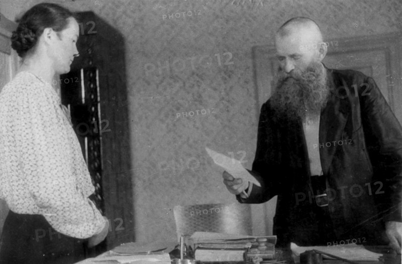 January, 1945, in poland, the agrarian reform has been carried out on the liberated polish territory, burgermeister of a village handing to a peasant the act granting the rights of possession of five hectares of land.