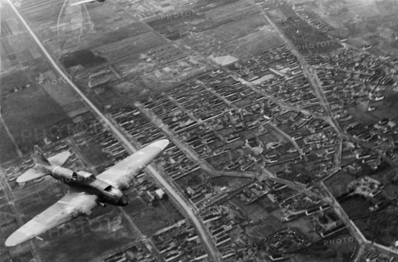 World war 2, 3rd ukrainian front, a soviet shturmovik plane flying over the city during the battle for budapest, january 1945.