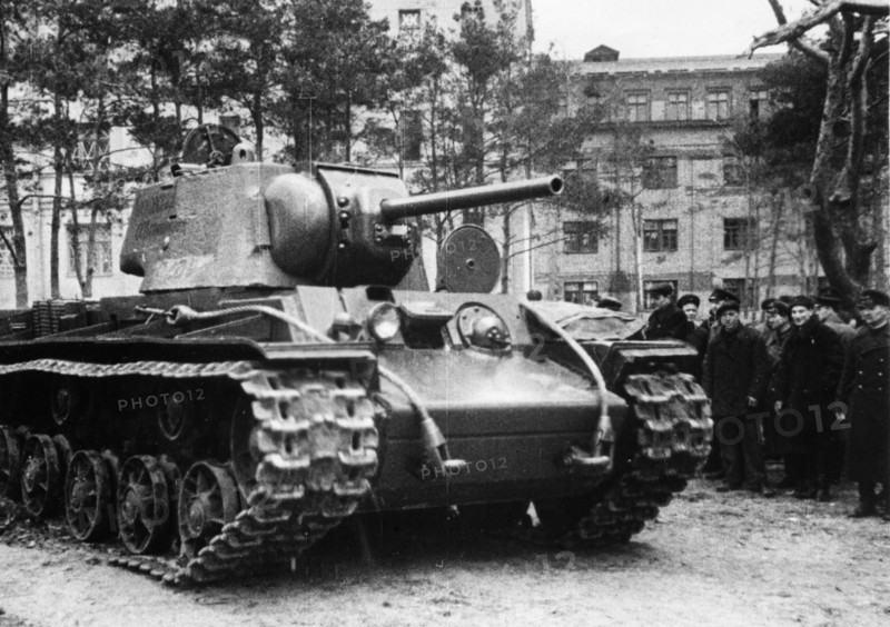 Kv-1 (klement voroshilov) tank, a group of civilians and red army men watch a new kv-1 tank that has just left the factory and will soon be on its way to the front, ussr, world war 2.