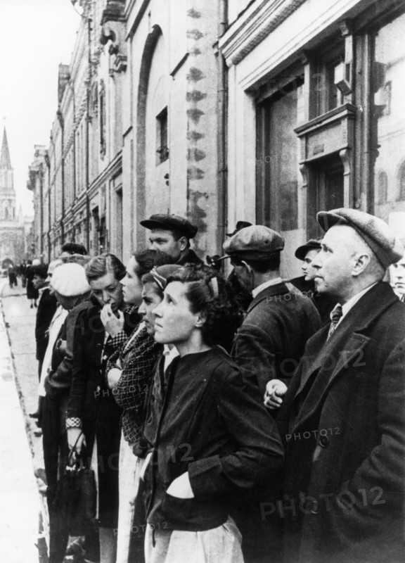 Moscow residents listening to a radio report by molotov announcing the invasion of the soviet union by germany, june 22, 1941.