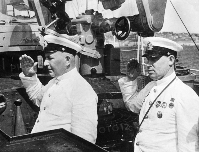 Commander of the pacific fleet of the ussr, vice-admiral yumashev (left) and chief of staff of the pacific fleet, rear-admiral boguenko, on the bridge of the torpedo boat, stalin.