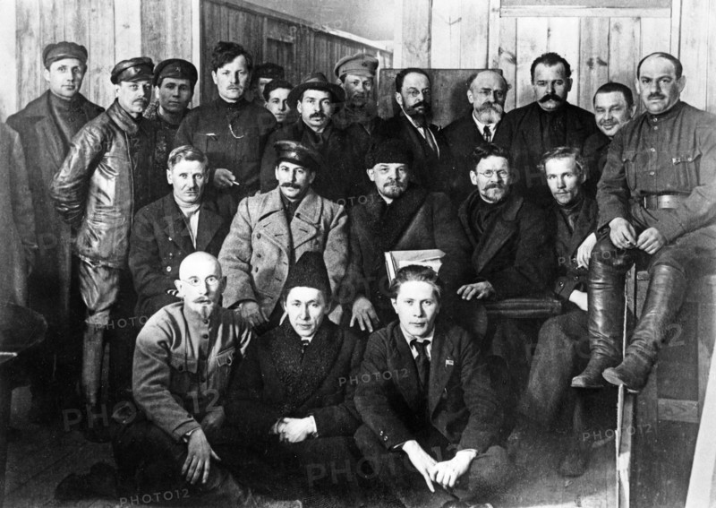 V,i, lenin, m,i, kalinin, i,v, stalin in a group of delegates of the 8th meeting of the bolshevik communist party in moscow, march 1919.