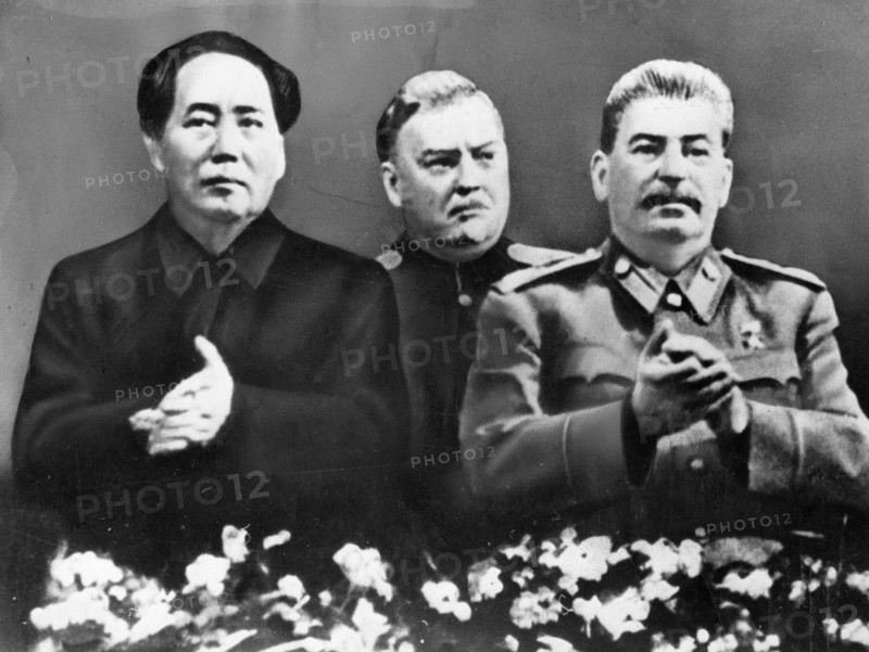 Communist leaders from two continents at the bolshoi theater in moscow at a meeting in honor of josef stalin's 70th birthday on december 21, 1949, (left to right: chairman mao zedong; armed forces minister marshal n,a, bulganin; and stalin).