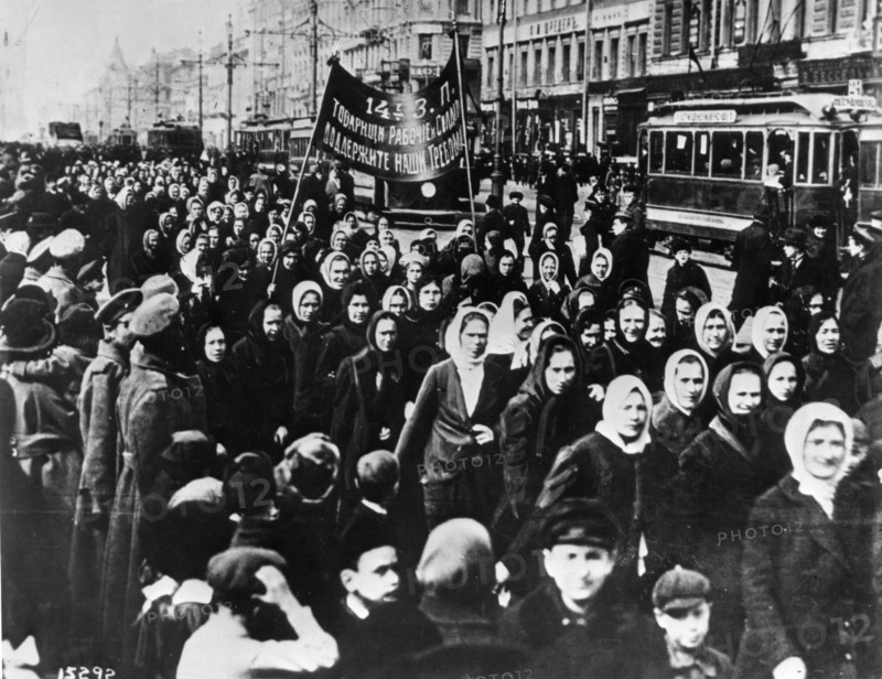 International women's day, women (mainly textile workers) demonstrate on petrograd's (st, petersburg) nevsky prospect shortly after the establishment of a provisional government, russia, february 1917, the soldiers' families are demanding increased rations for the troops, the banner reads 'comrade workers and soldiers, support our demands'.