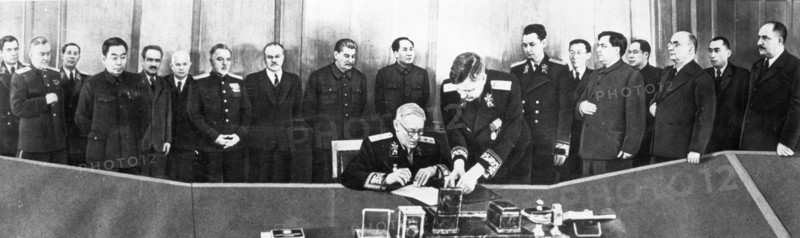 A,y, vishinsky signing the treaty of friendship, alliance, and mutual assistance between the soviet union and the chinese people's republic in 1950, (left to right: a,a, gromyko, n,a, bulganin, n,v, roshchin, chou enlai, a,i, mikoyan, n, khrushchev, k, voroshilov, v,m, molotov, stalin, mao zedong, b,v, podtserop, n,t, fedorenko, wang cha hsiang, g,m, malenkov, cheng po ta, l,p, beria, mr, azizov, and l,m, kaganovich).