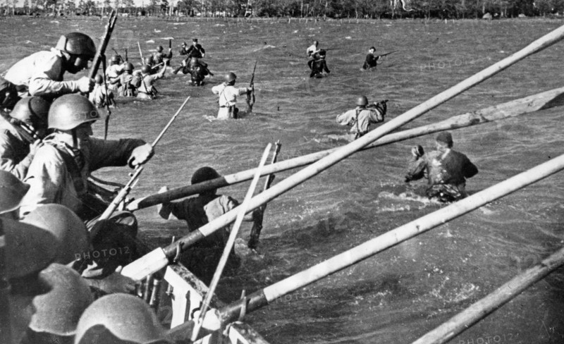 Baltic fleet, a detachment landing from boats in the leningrad area, making a commando type raid, (1940s or 1950s?).