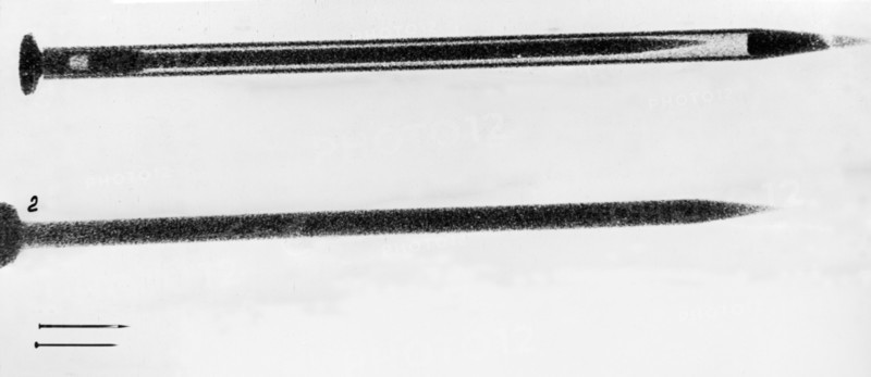 Top: x-ray photograph of one of the poison pins gary powers was provided with (enlarged 9 times), figure 2: inside needle of the pin with the grooves filled with poison, bottom: actual size of poison pin, shown with an ordinary pin, 1960, u2 spy plane misson.