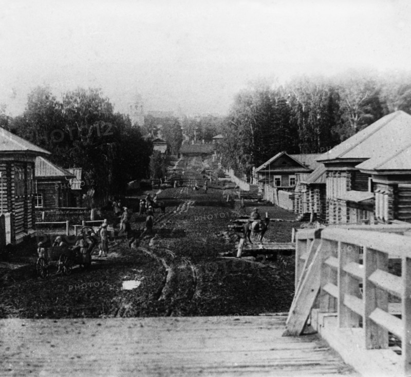 A view of the village of kudymkar in northern russia in the late 1800s or early 1900s.