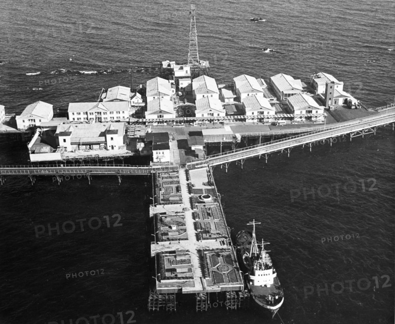 Housing built at neftyanye kamni (oil rocks), an oil workers settlement on the caspian sea in azerbaijan, ussr, february 1969, a park for the workers is in the foreground.