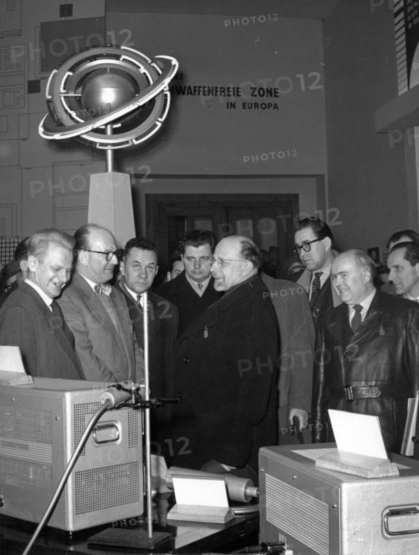 Leipzig spring fair 1958, walter ulbricht and a,n, kosygin (3rd from left) looking over the exhibits in the nuclear techniques pavillion.