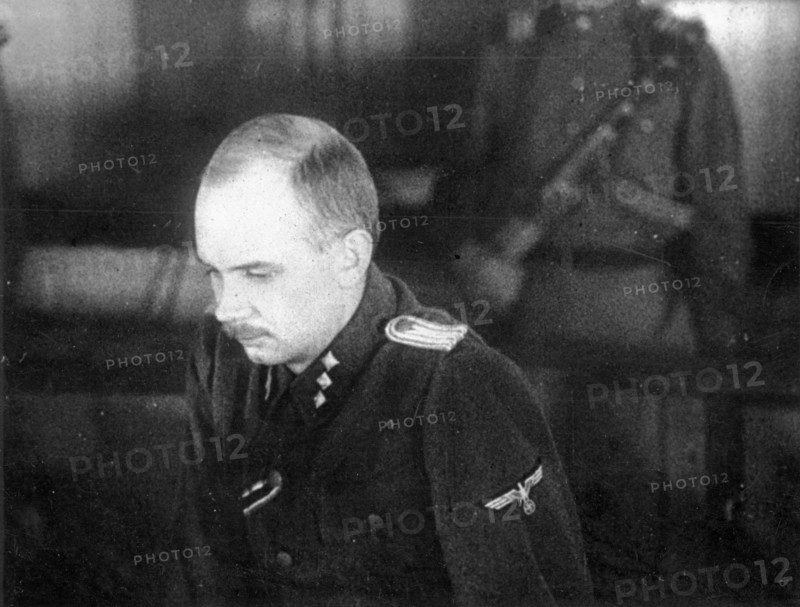 World war 2, december 15, 1943, still from a film on the kharkov trial produced by artkino, unterzturnfurher, ss hans ritz, deputy commander of the ss company of the 'sonderkommando sd' in the docket at the kharkov trial.