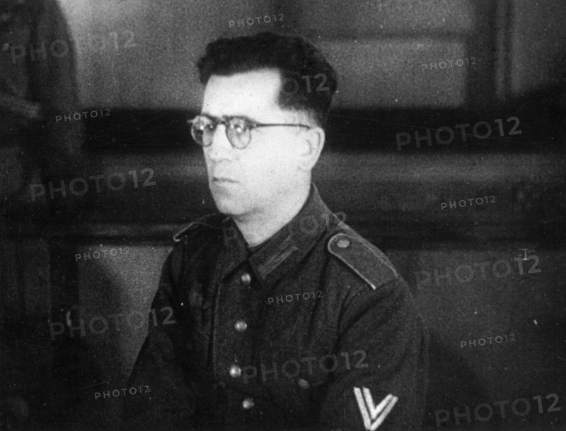 World war 2, december 15, 1943, still from a film on the kharkov trial produced by artkino, senior corporal of the auxiliary police, reinhard retzlaw, an officer of the 560th group of the german secret field police, on trial at kharkov.