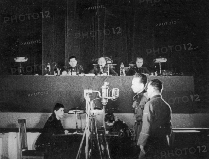 World war 2, december 13, 1943, still from a film on the kharkov trial produced by artkino, witness, obersturmbannfuhrer (major general) heinisch, testifying through interpreter kopilov.