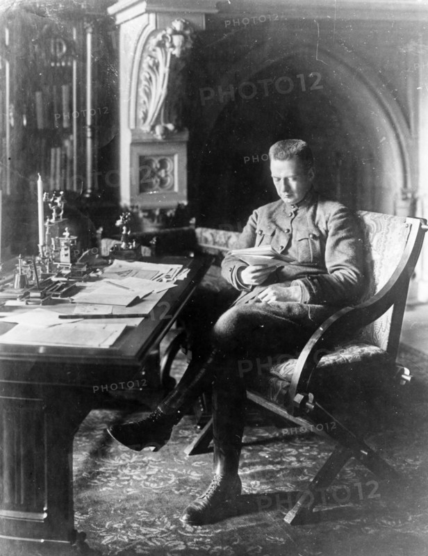 Alexander kerensky, leader of the provisional government, in his office in the winter palace, petrograd, 1917.