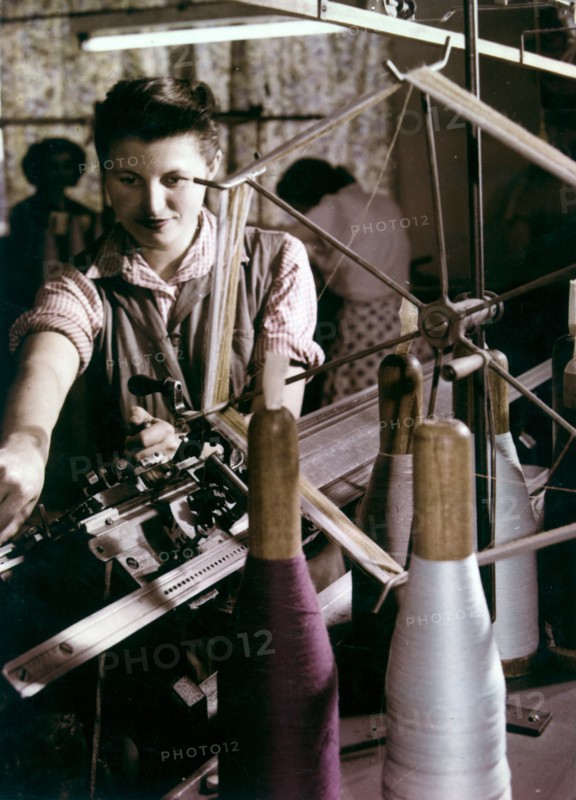 Woman worker at a textile factory in budapest, hungary, 1950s.