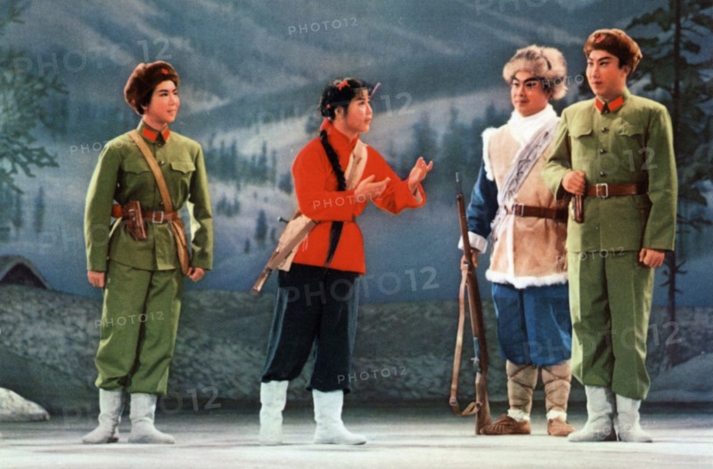 The modern revolutionary peking opera 'taking tiger mountain by strategy', carefully revised, perfected and polished to the last detail with our great leader chairman mao's loving care, now glitters with surpassing splendour,' from a postcard set issued in china in 1970, 'scene 9 - the hunter's daughter chang pao firmly requests to go into battle to wipe out the bandits,'.