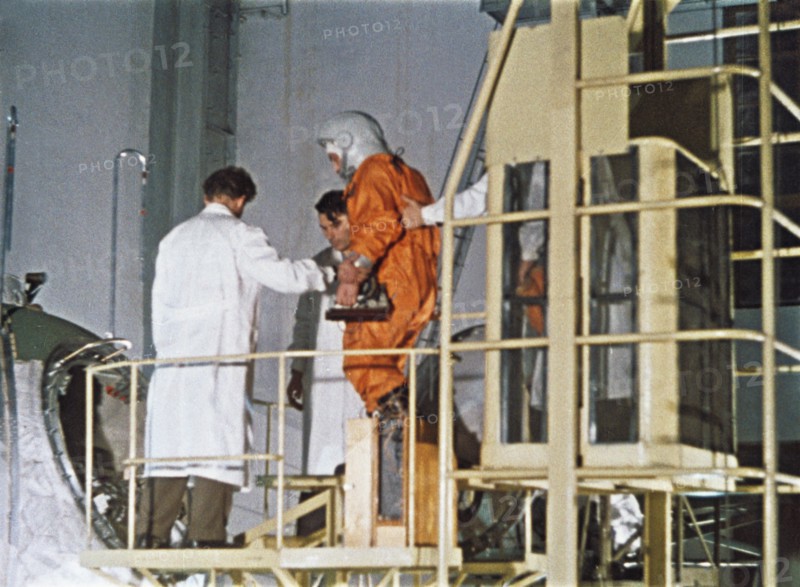 Soviet cosmonaut yuri gagarin boarding vostok 1 rocket in 1961, this is a still from a soviet film about the space program.