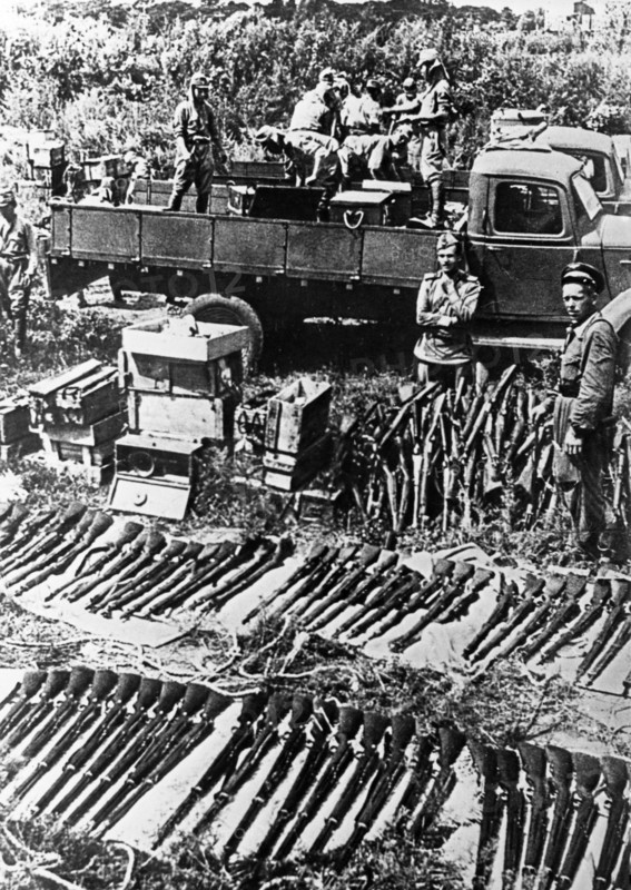 World war 2, far eastern front (manchuria), red army soldiers with captured japanese arms and supplies, 1945.