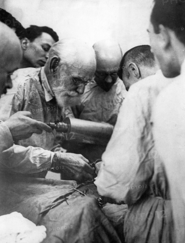 Academician ivan pavlov operating on one of his dogs at the institute of experimental medicine in leningrad, 1929.
