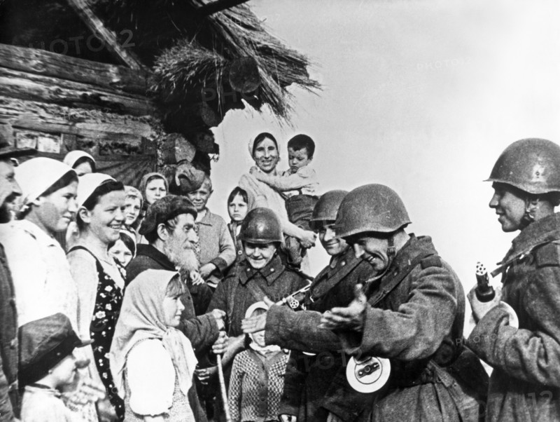 The population of a byelorussian village meeting the soviet red army liberators during world war 2.