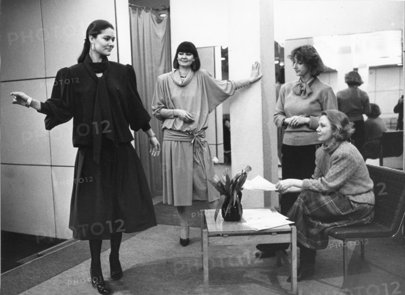 A model showsa dress in new collection to designers, moskvichka fashion house, moscow, ussr, 1986.
