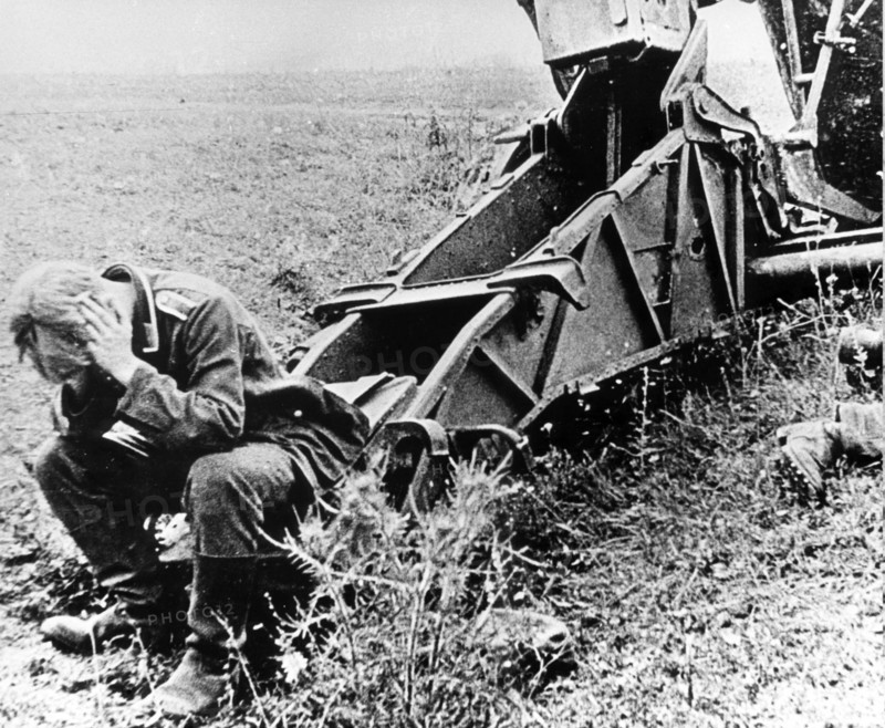 An exhausted nazi gunner taken prisoner in the battle at the kursk bulge which crippled hitler's army who never recovered, summer 1943.