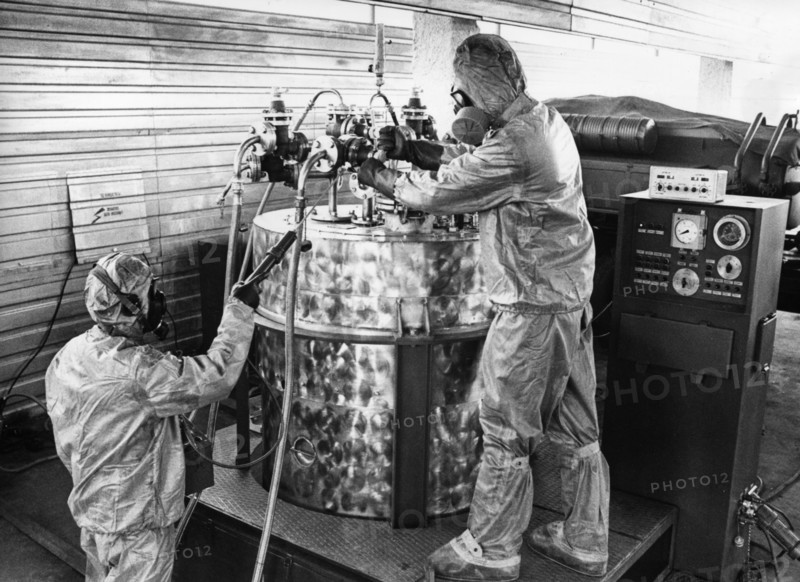 Technicians in protective suits operating a mobile chemical agents destruction unit at soviet military base of shikhany, saratov region, ussr, october 4th 1987, diplomats and military experts from 45 countries witnessed a mass decommissioning of chemical weapons.