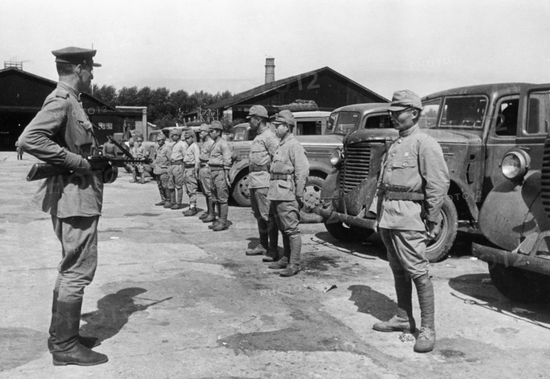 Operation august storm (battle of manchuria), a japanese transport column surrendering to soviet troops in harbin, manchuria, august 1945.